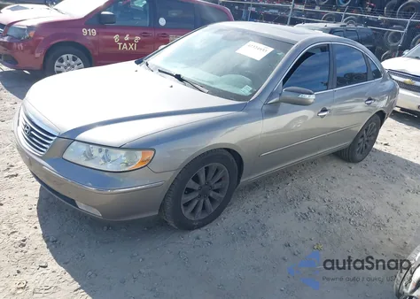 2009 Hyundai Azera Limited z USA, uszkodzony, nr VIN KMHFC46F09A372008